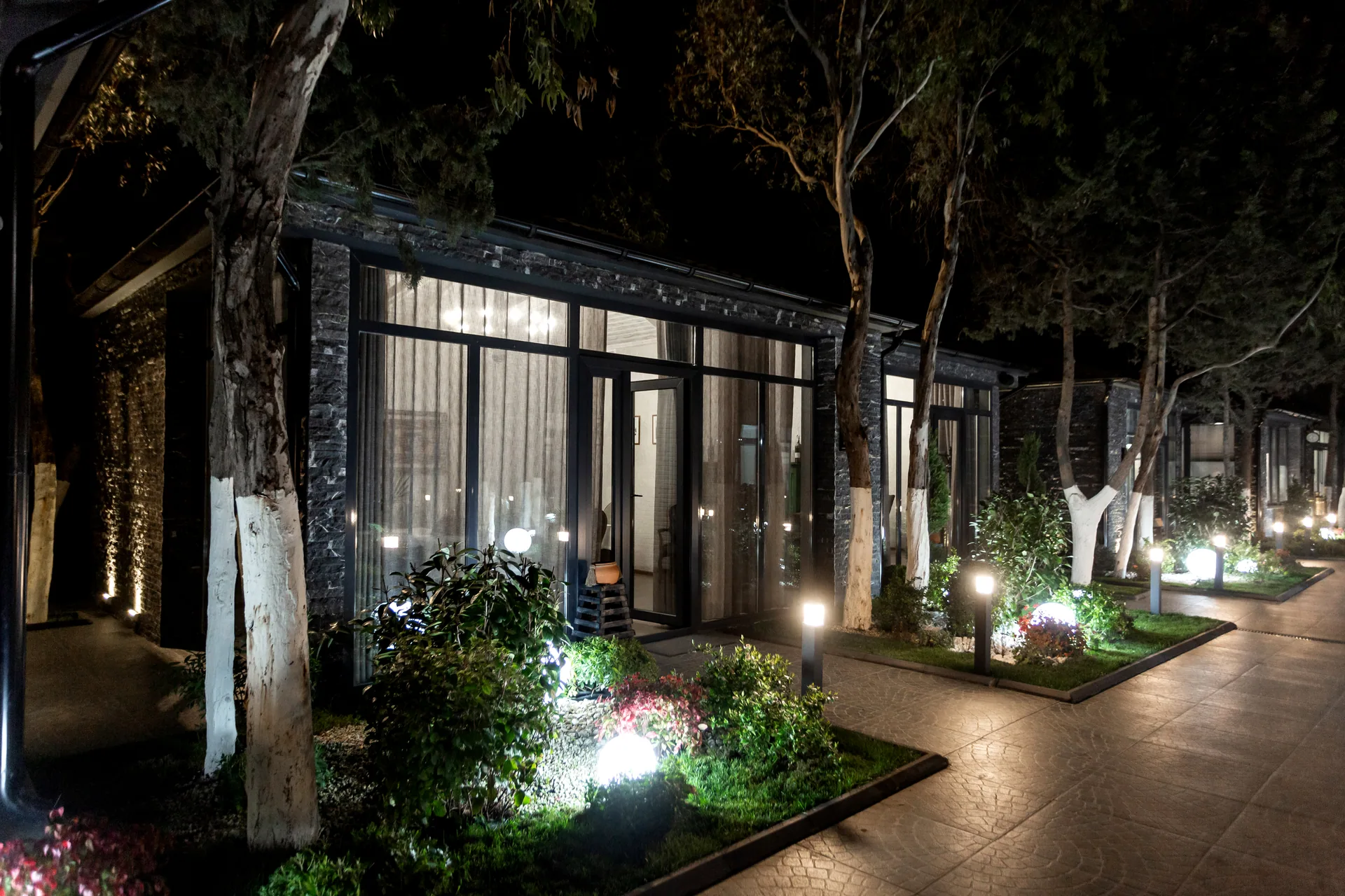 Night landscape lighting glass front building columbia SC